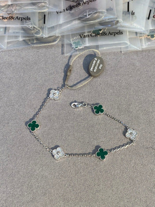 Van Cleef & Arpels Mini Six-Motif Bracelet with Malachite and Diamonds