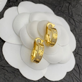 Cartier Marielle Gold Medallion Hoop Earrings