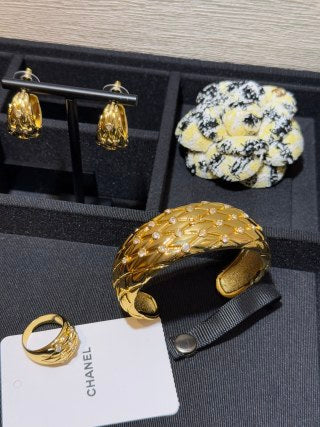 CHANEL Quilted Radiance Gold Bangle Bracelet