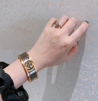 Gucci Interlocking G Monogram Canvas Wide Cuff Bracelet